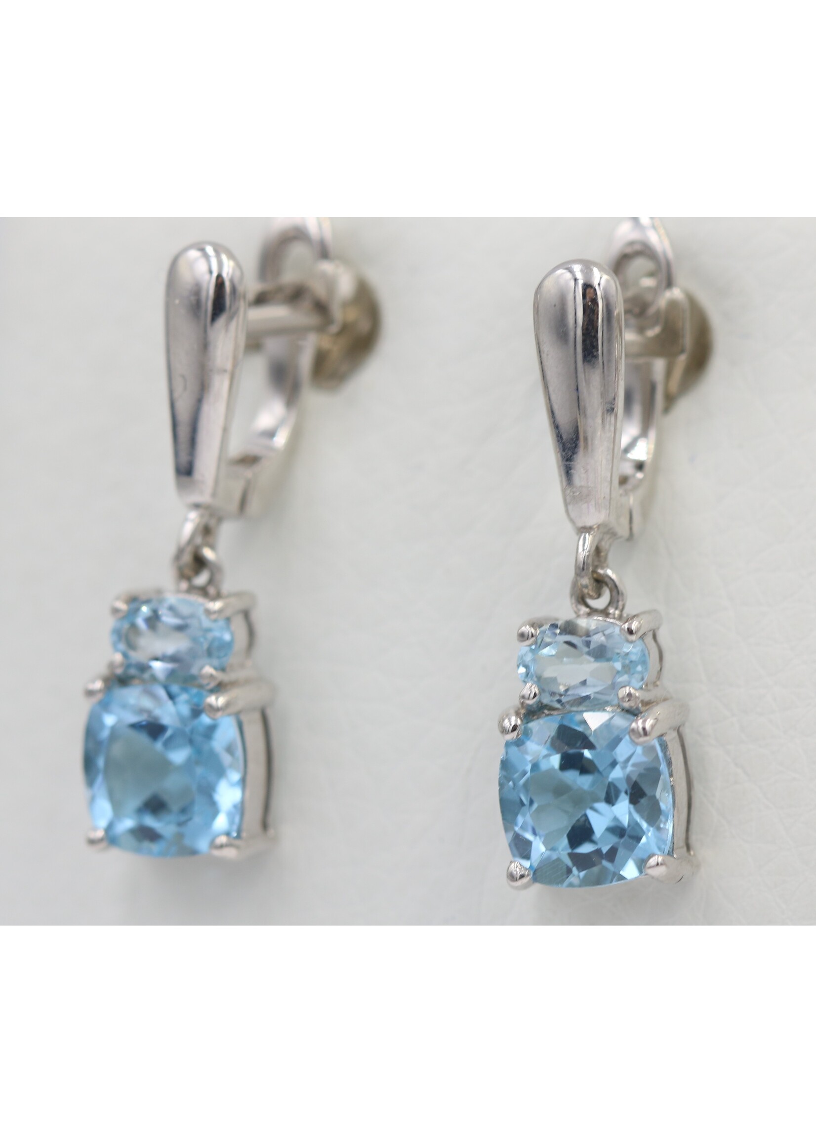 925 rhodium plated silver earrings set with natural Blue Topaz