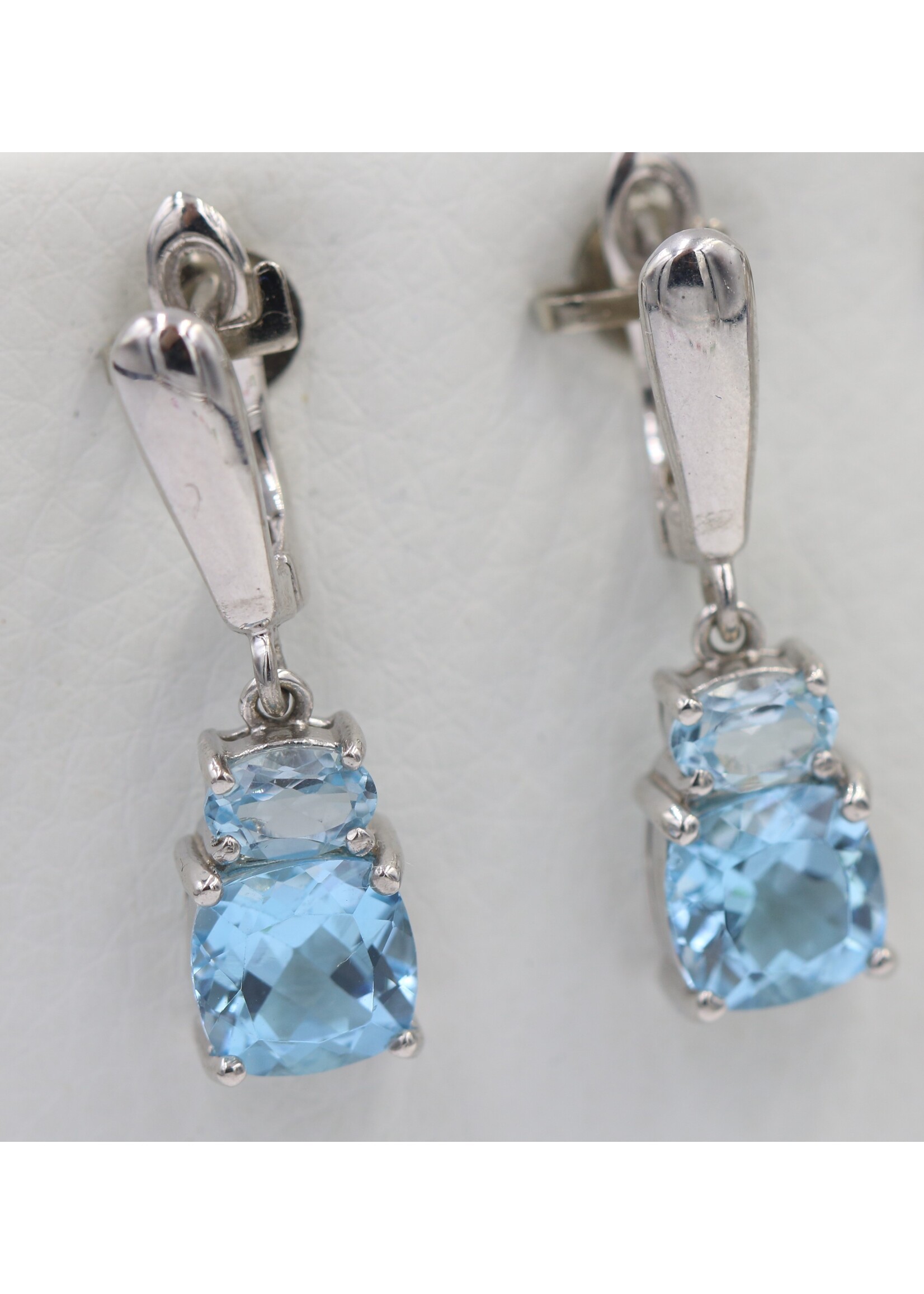 925 rhodium plated silver earrings set with natural Blue Topaz