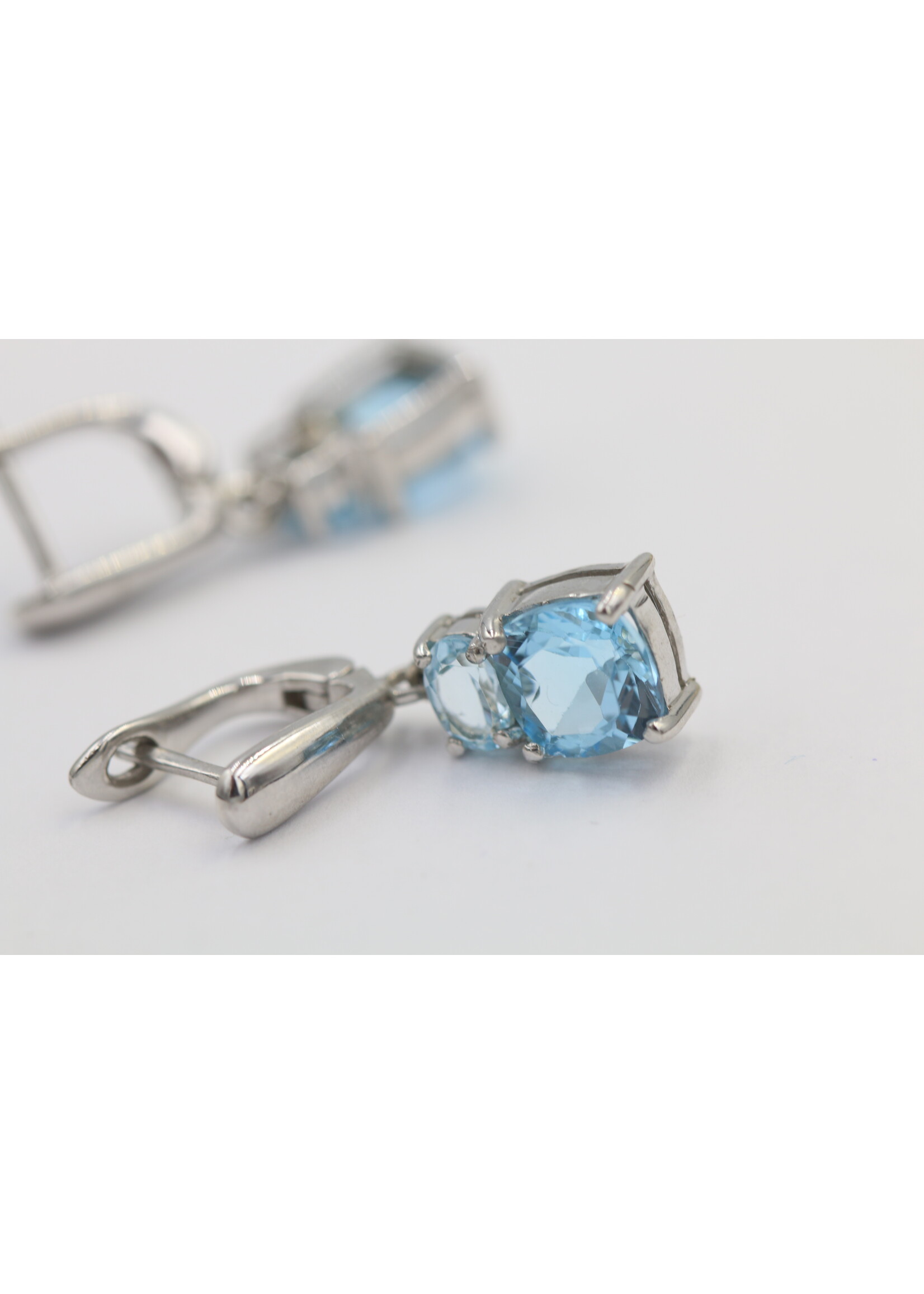 925 rhodium plated silver earrings set with natural Blue Topaz