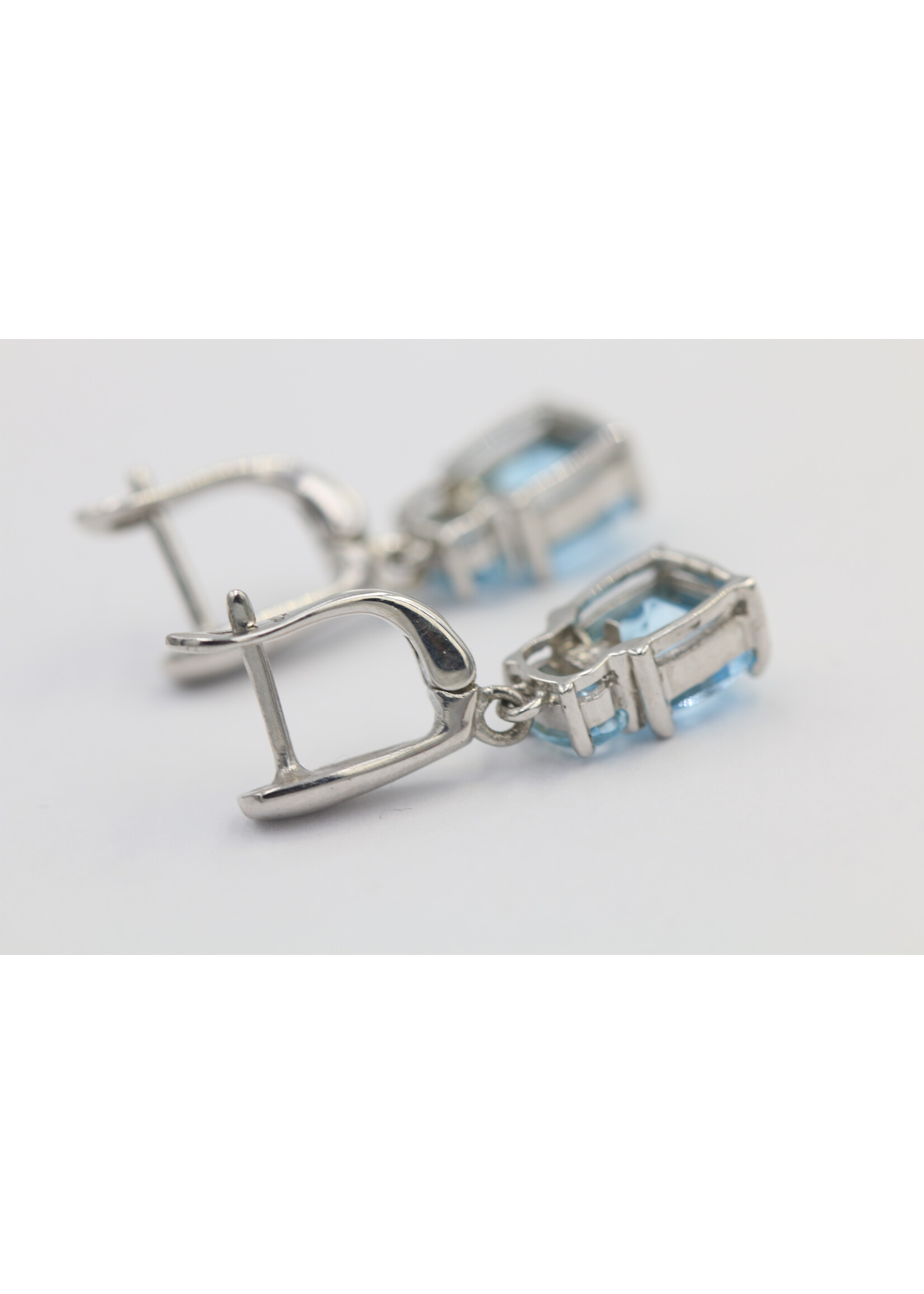 925 rhodium plated silver earrings set with natural Blue Topaz