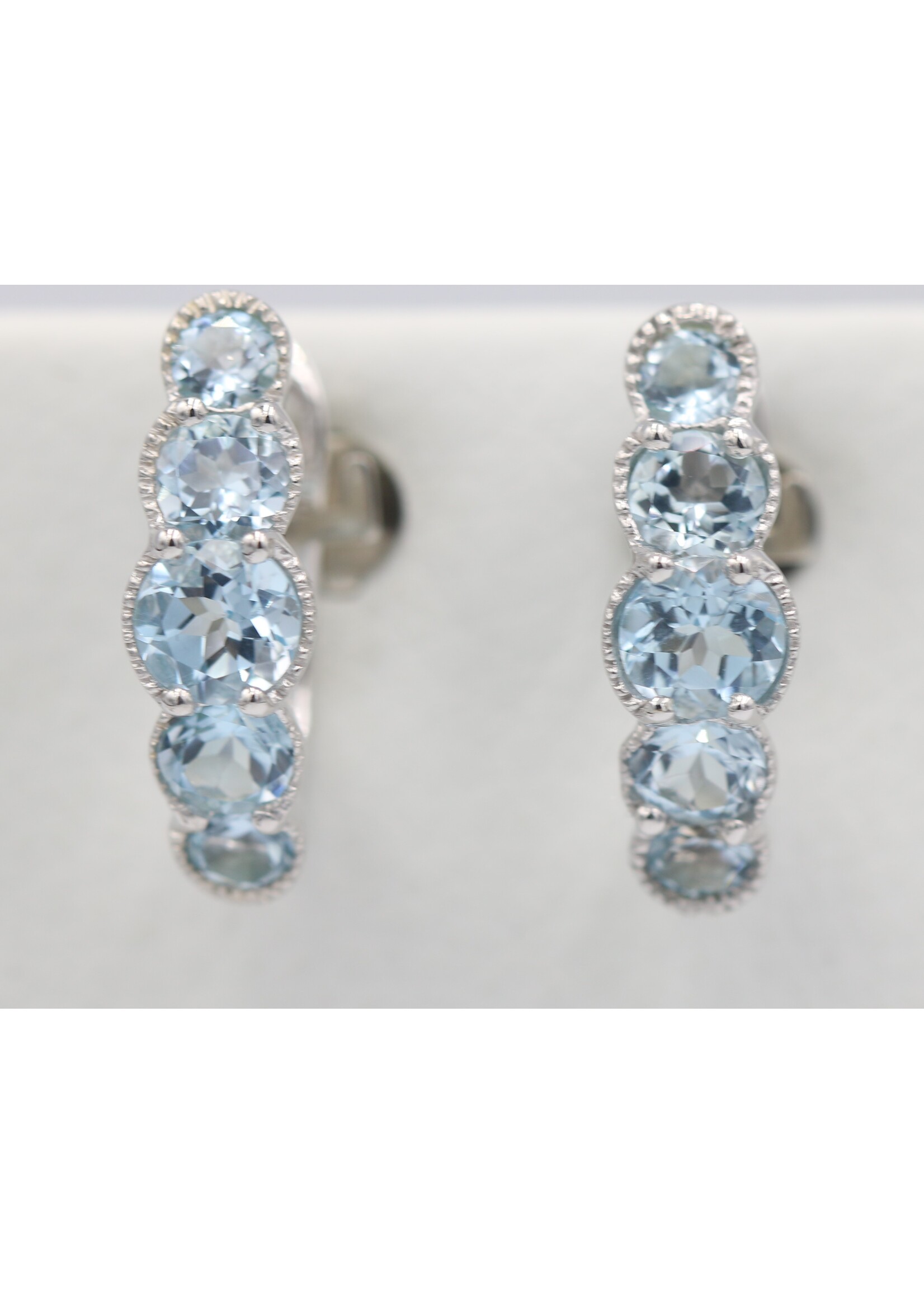 925 rhodium plated silver earrings set with natural Blue Topaz