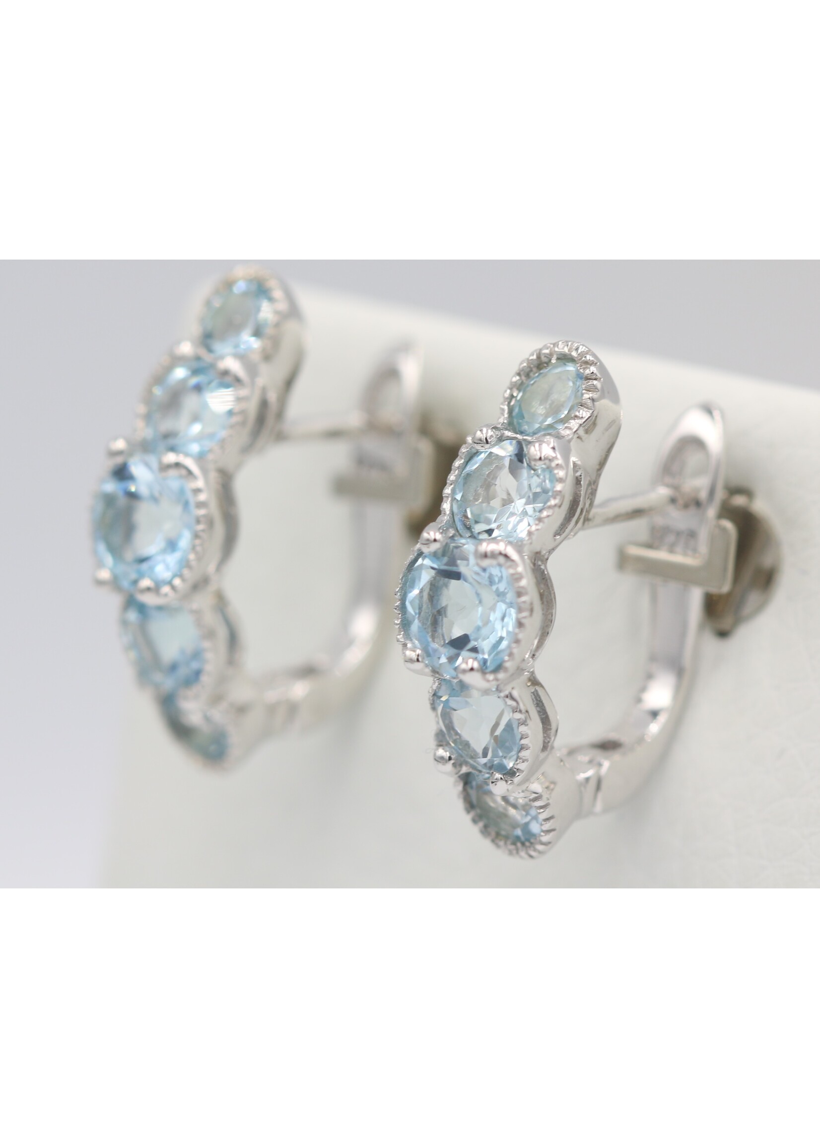 925 rhodium plated silver earrings set with natural Blue Topaz