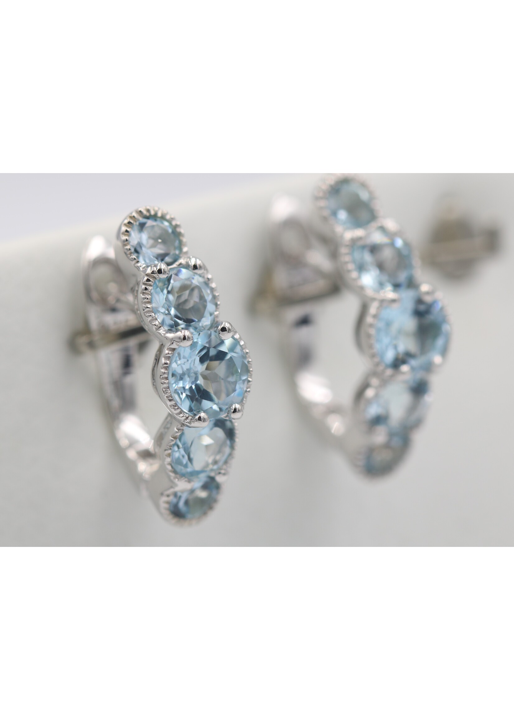 925 rhodium plated silver earrings set with natural Blue Topaz