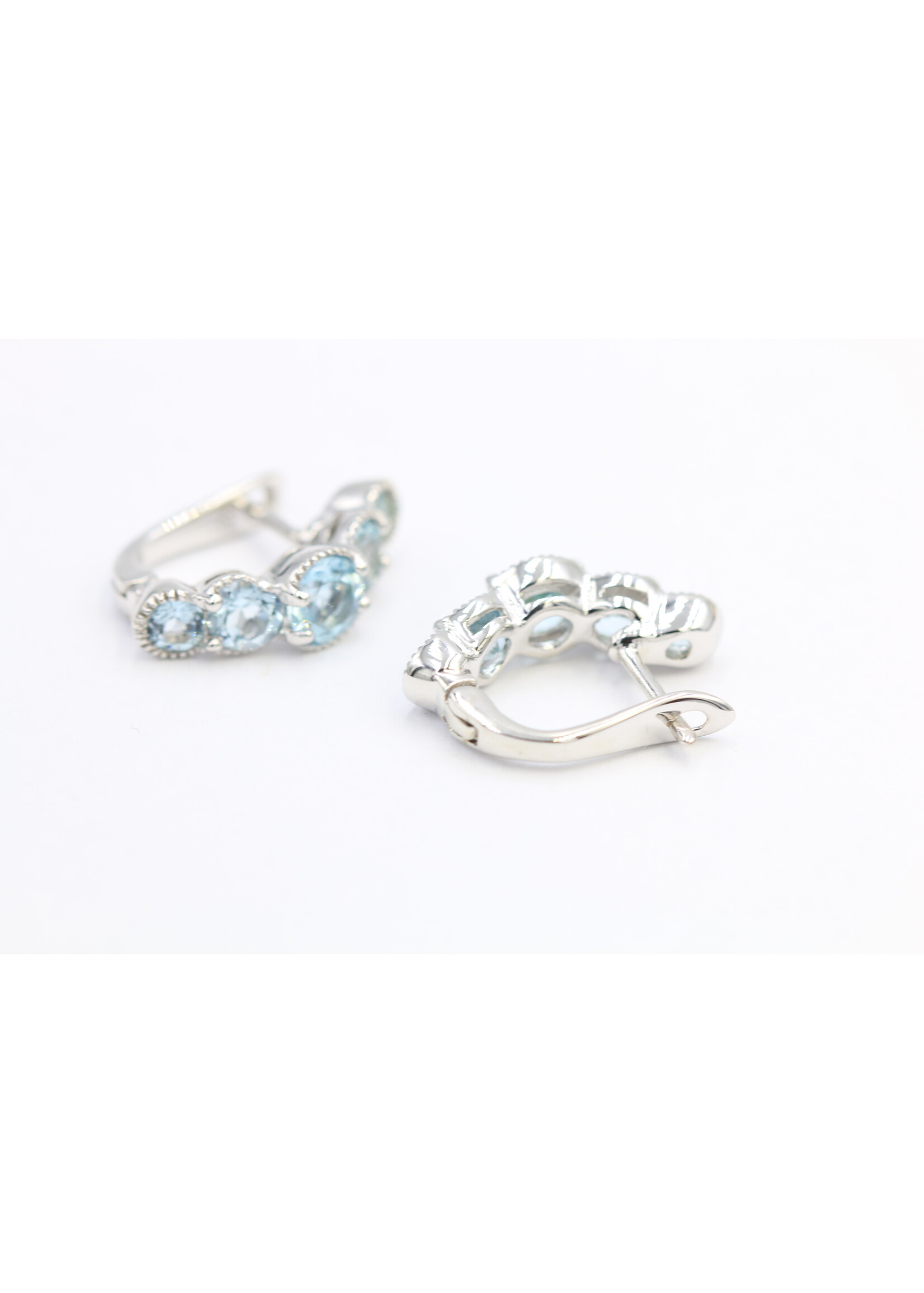 925 rhodium plated silver earrings set with natural Blue Topaz