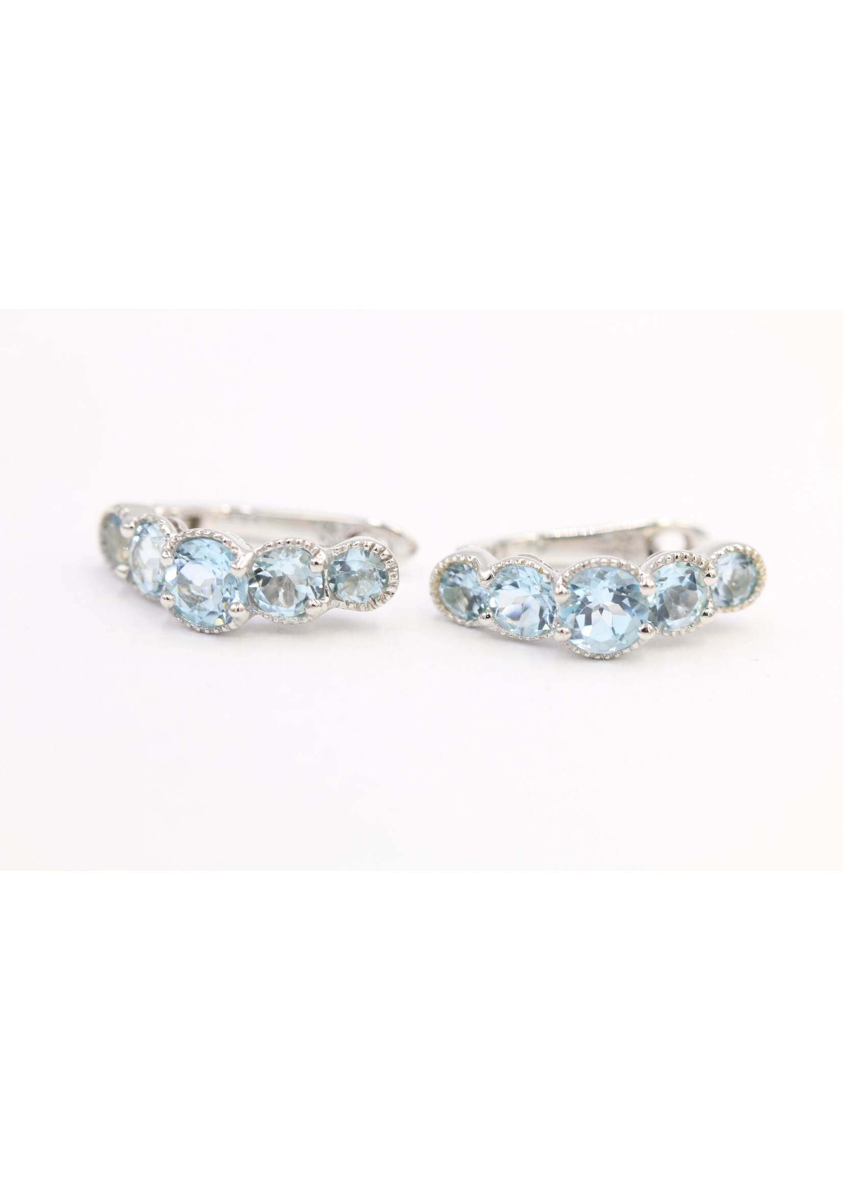 925 rhodium plated silver earrings set with natural Blue Topaz