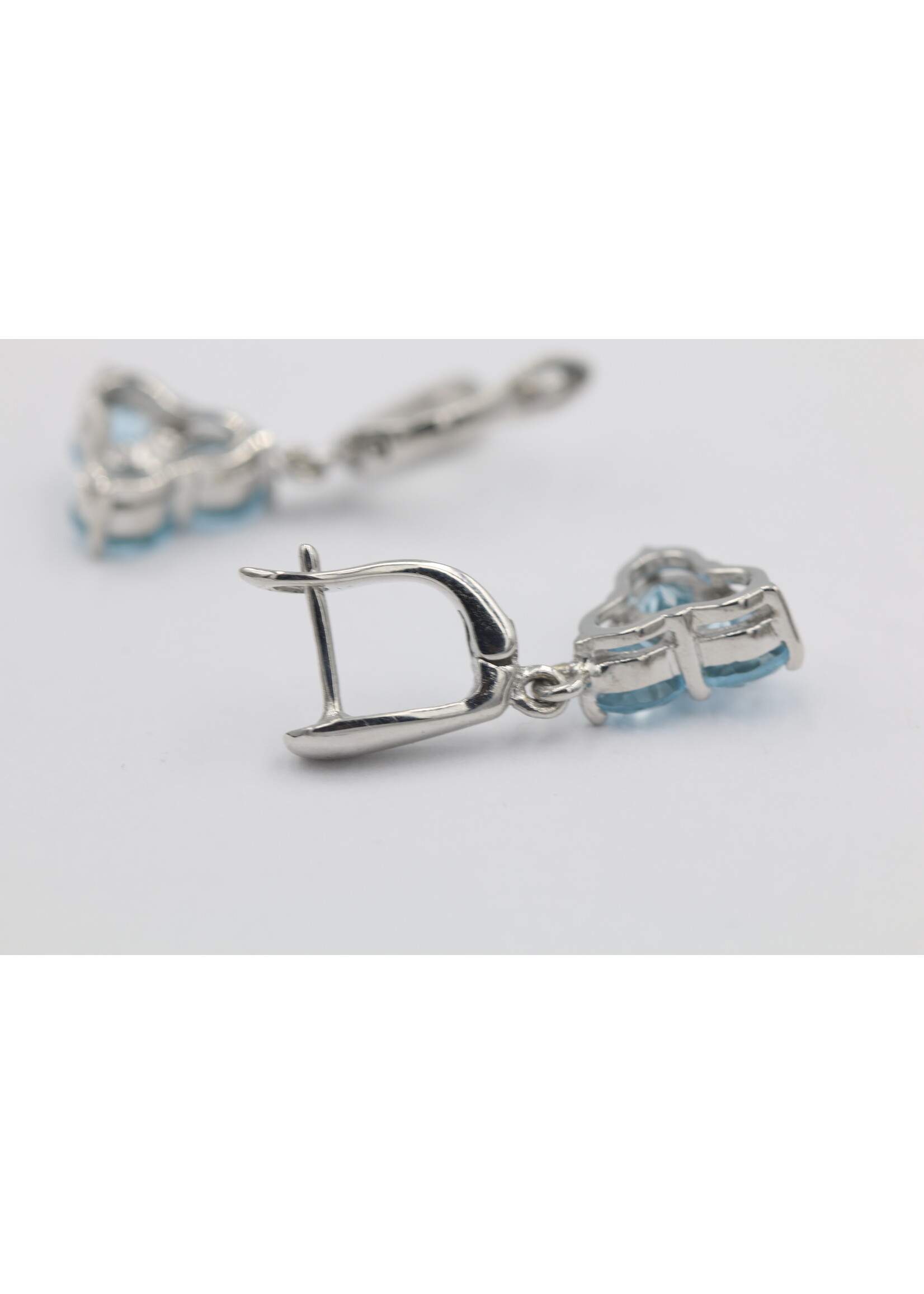 925 rhodium plated silver earrings set with natural Blue Topaz