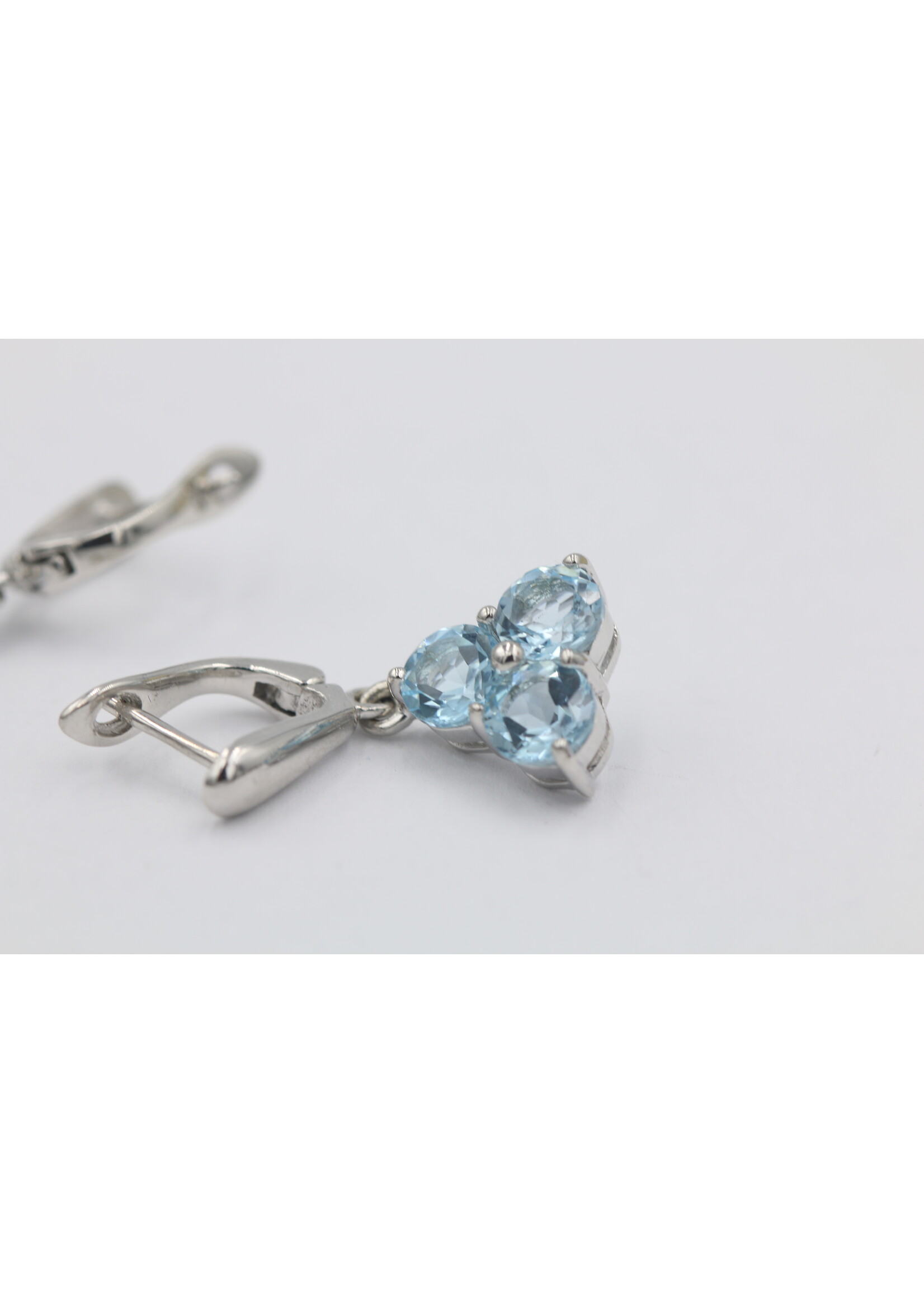 925 rhodium plated silver earrings set with natural Blue Topaz