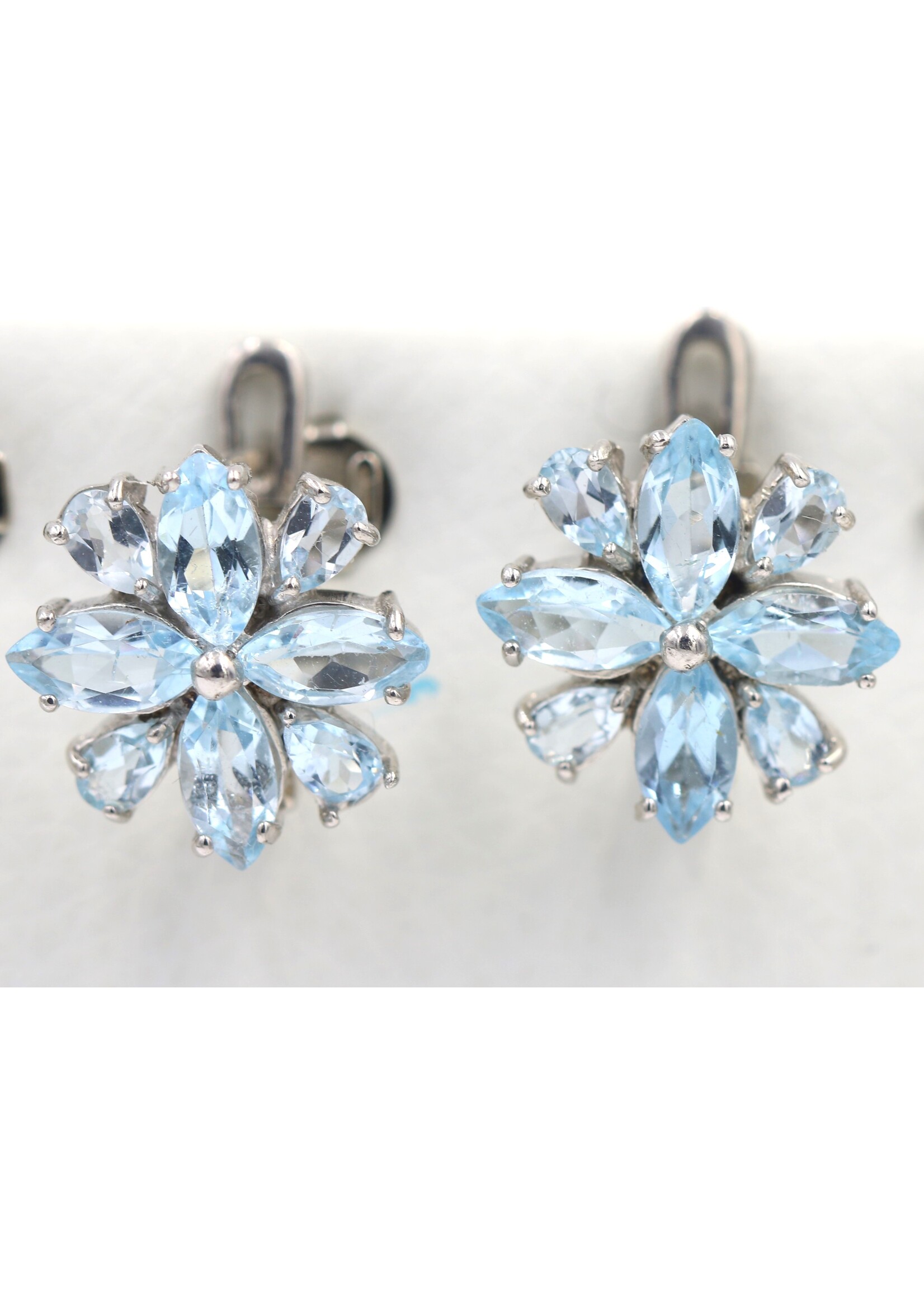 925 rhodium plated silver earrings set with natural Blue Topaz