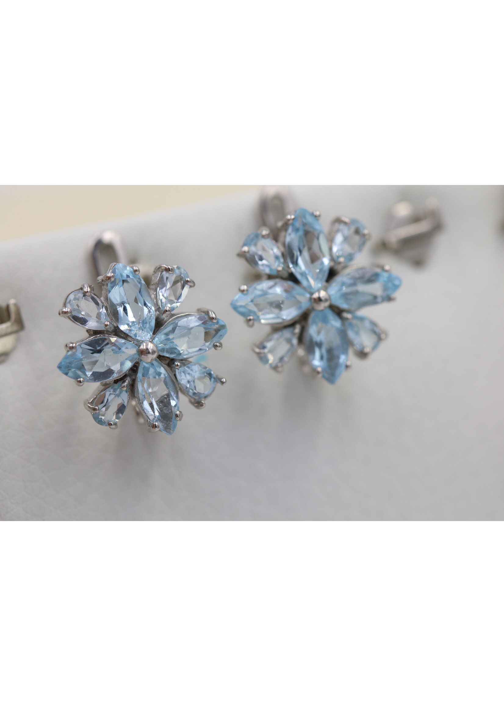 925 rhodium plated silver earrings set with natural Blue Topaz
