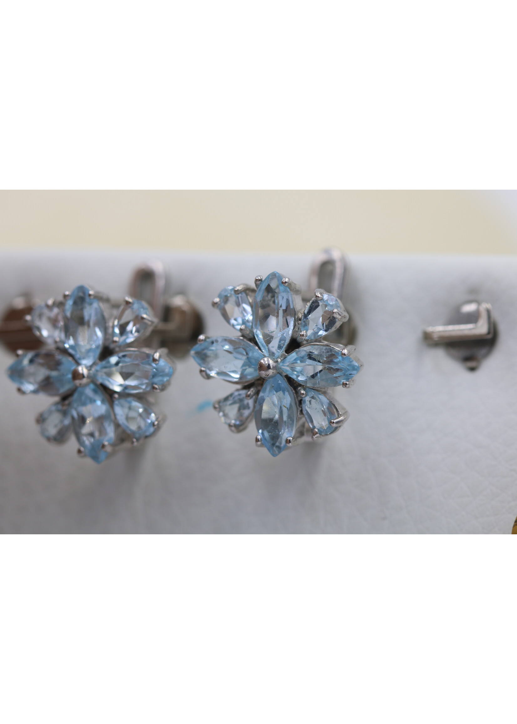 925 rhodium plated silver earrings set with natural Blue Topaz