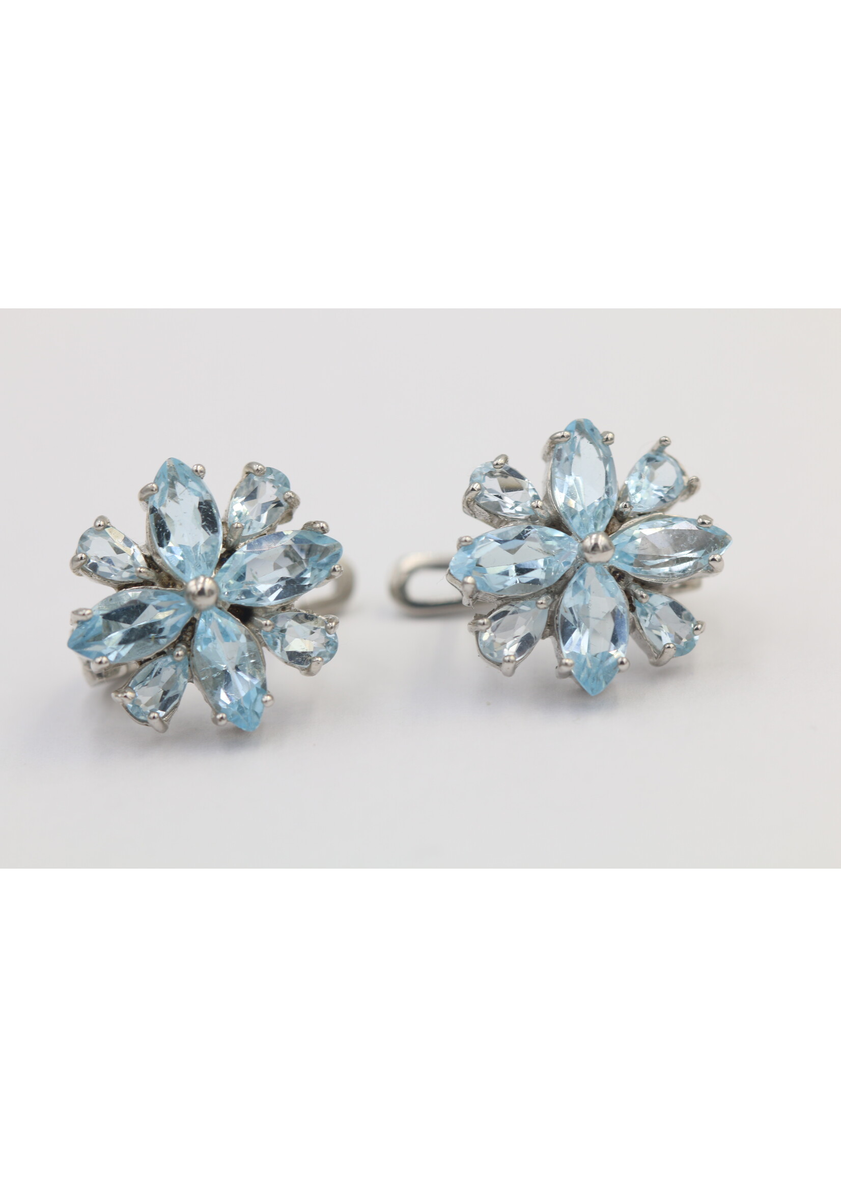925 rhodium plated silver earrings set with natural Blue Topaz