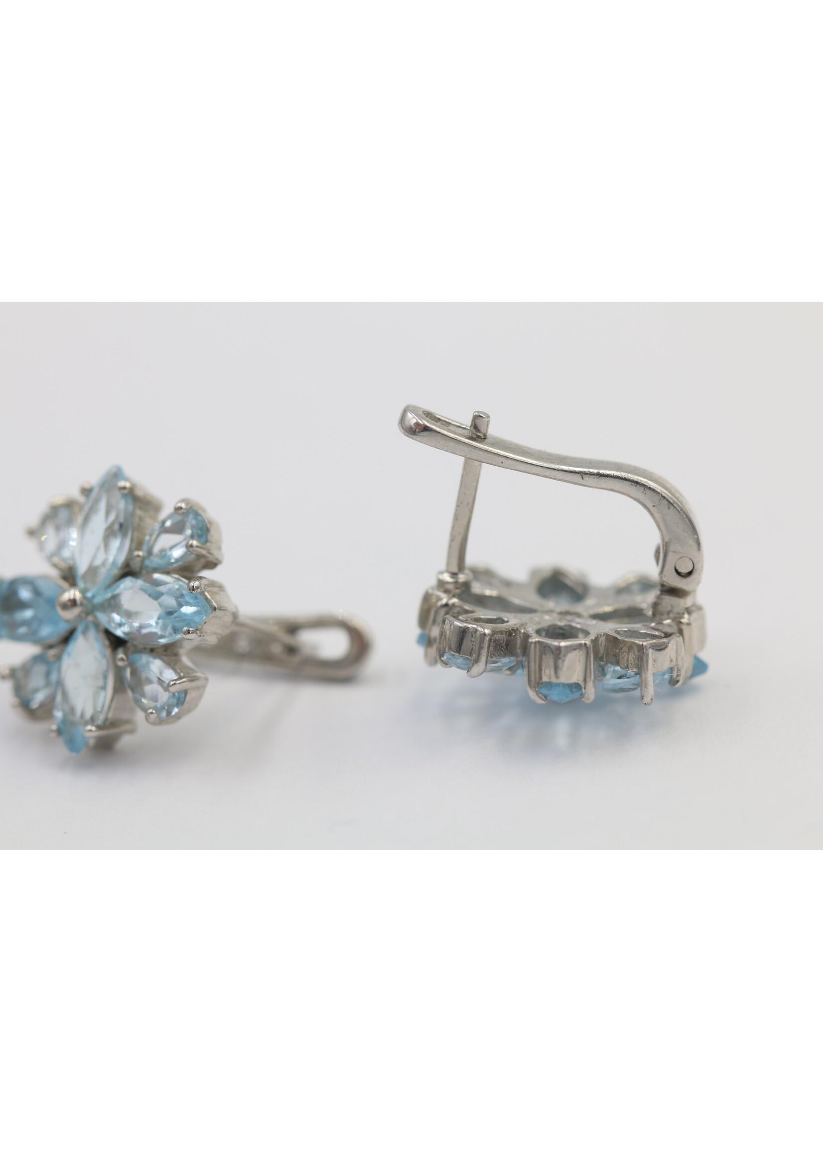 925 rhodium plated silver earrings set with natural Blue Topaz