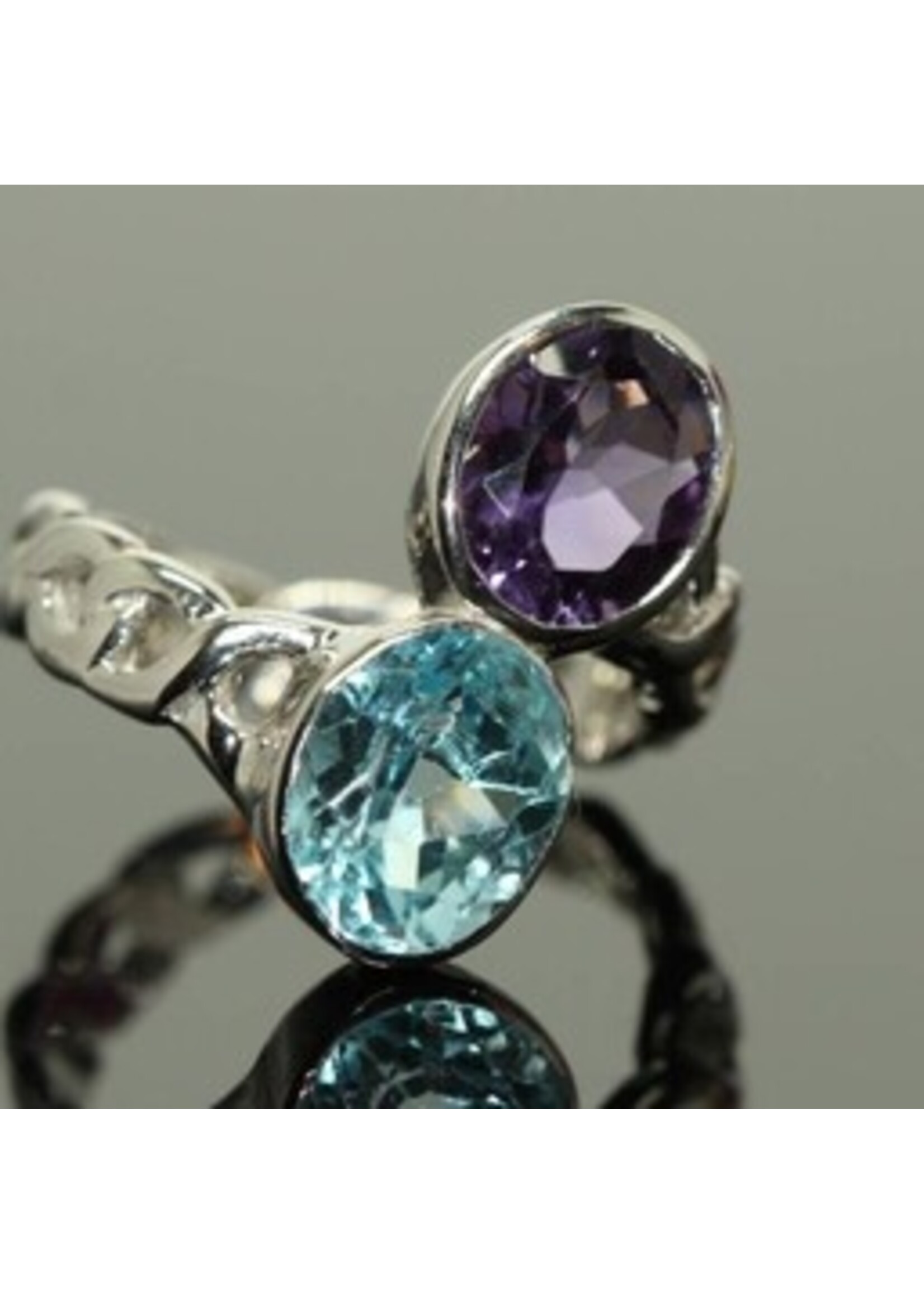 Bague en argent 925 rhodié serti naturel topaze bleue et améthyste