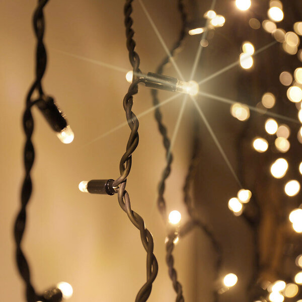 Rideau lumineux noir reliable | à partir de 2 mètres | 300 LEDs | 2200K blanc extra chaud avec scintillement | caoutchouc