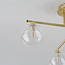 Plafonnier élégant doré avec 4 globes en verre transparent - Nymo