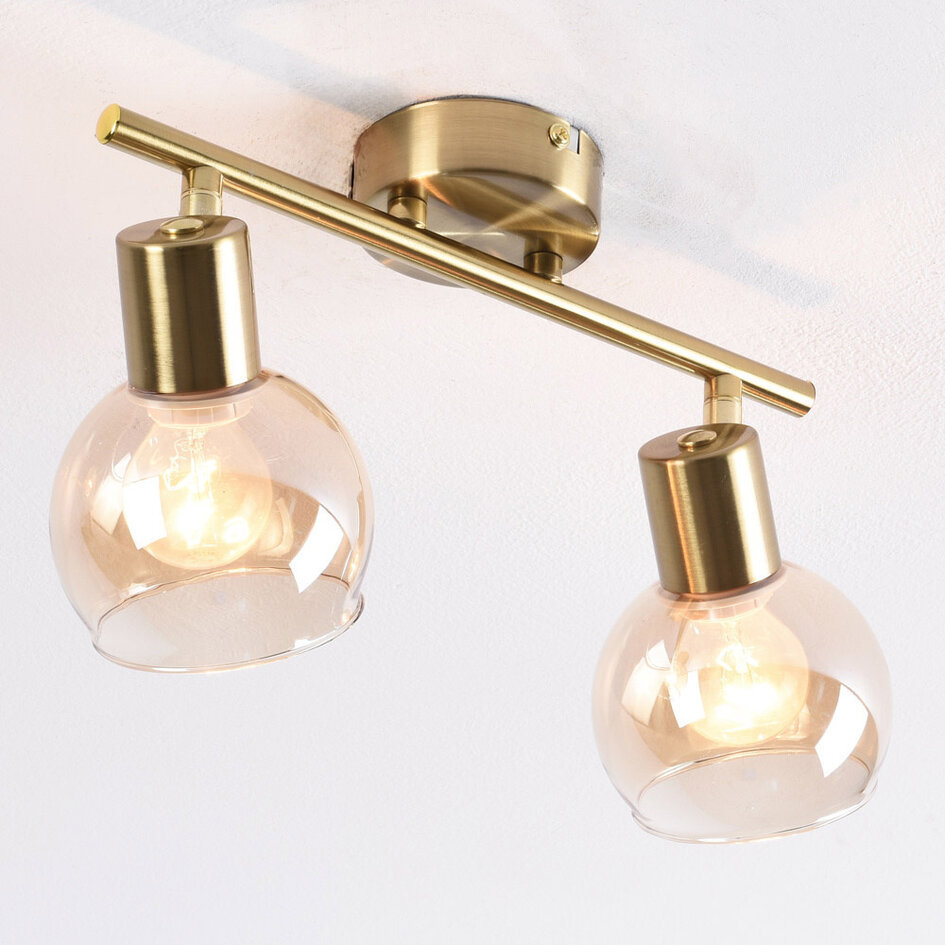 Plafonnier doré Phiene avec 2 spots en verre ambré orientables