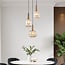 Suspension design 3 lumières Sita - noir et doré avec verre ambré