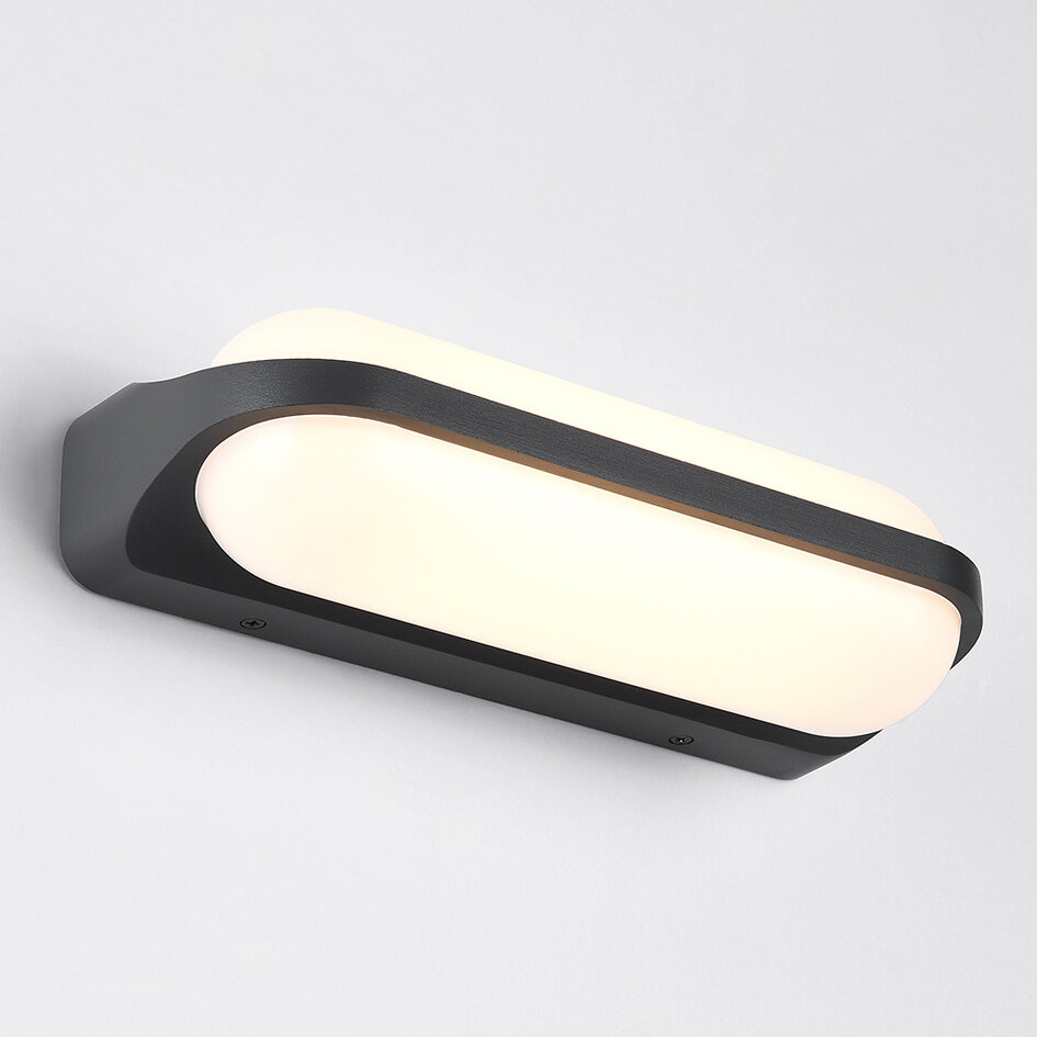 Cilinder buitenwandlamp Tyler - zwart met geïntegreerde LED