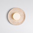 Elegante wandlamp Arto van travertin (natuursteen) en melkwit glas