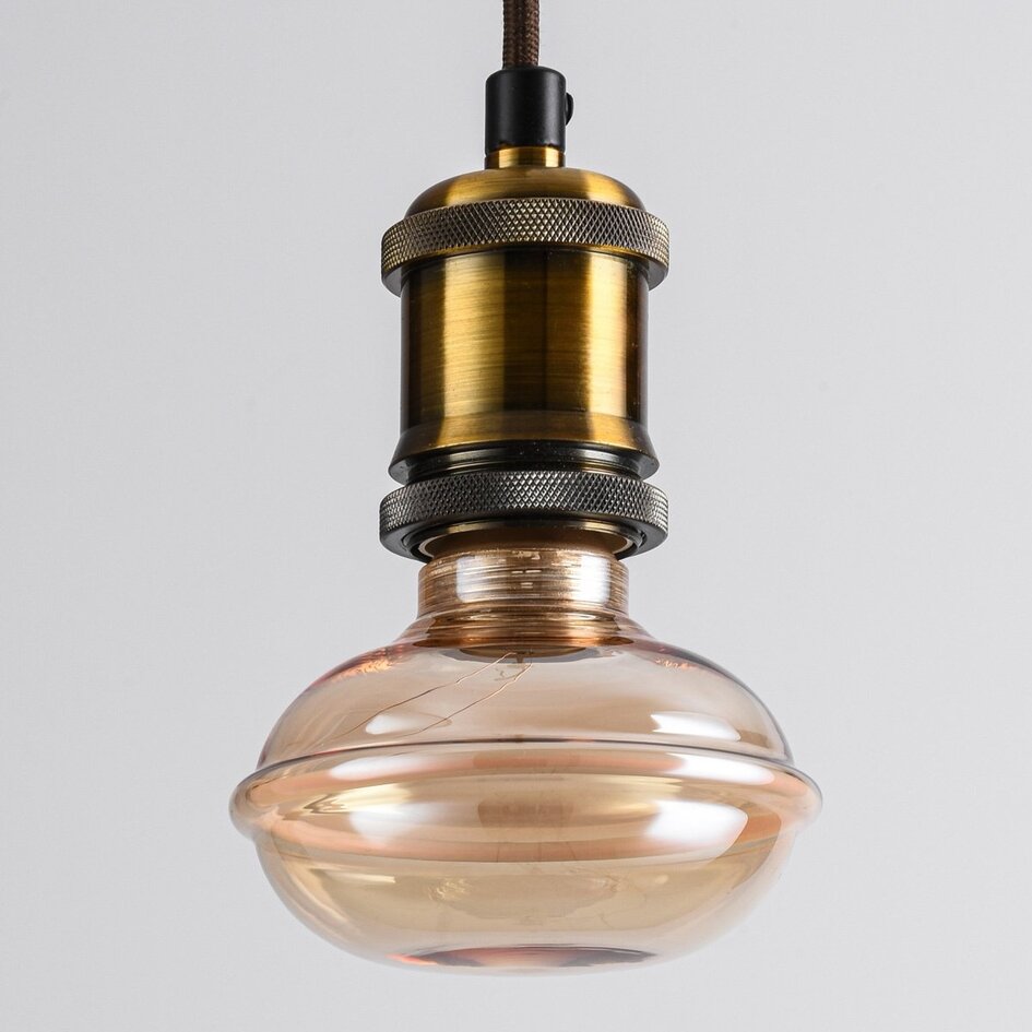 Ampoule à filament UFO E27 4W dimmable, Ø10 cm, 1800K, verre ambré avec anneau horizontal