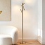 Lampadaire de luxe Zhan avec trois spots orientables et variateur tactile – doré