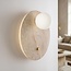 1-lichts wandlamp Artoa van travertin (natuursteen) met glazen bol