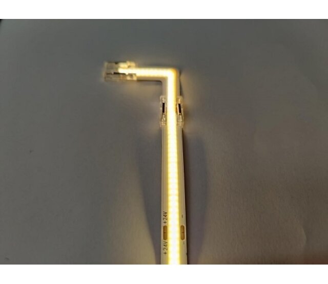 Doorverlichte 24 volt COB LED Strip - 90 graden transparante hoek connector T.B.V. 2700K extra warm witte COB LED Strips  - IP20 Doorverlichte 24 volt COB LED Strip - 90 graden transparante hoek connector T.B.V. 2700K extra warm witte COB LED Strips  - IP20