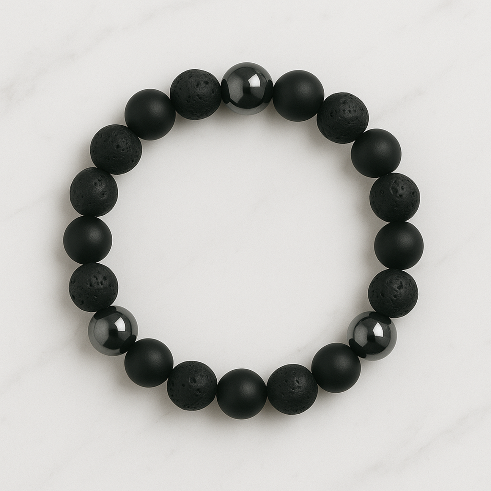 Aura Dorno Aura Dorno Armband Black Lava Ground – handgemaakt van lavasteen, onyx en hematiet