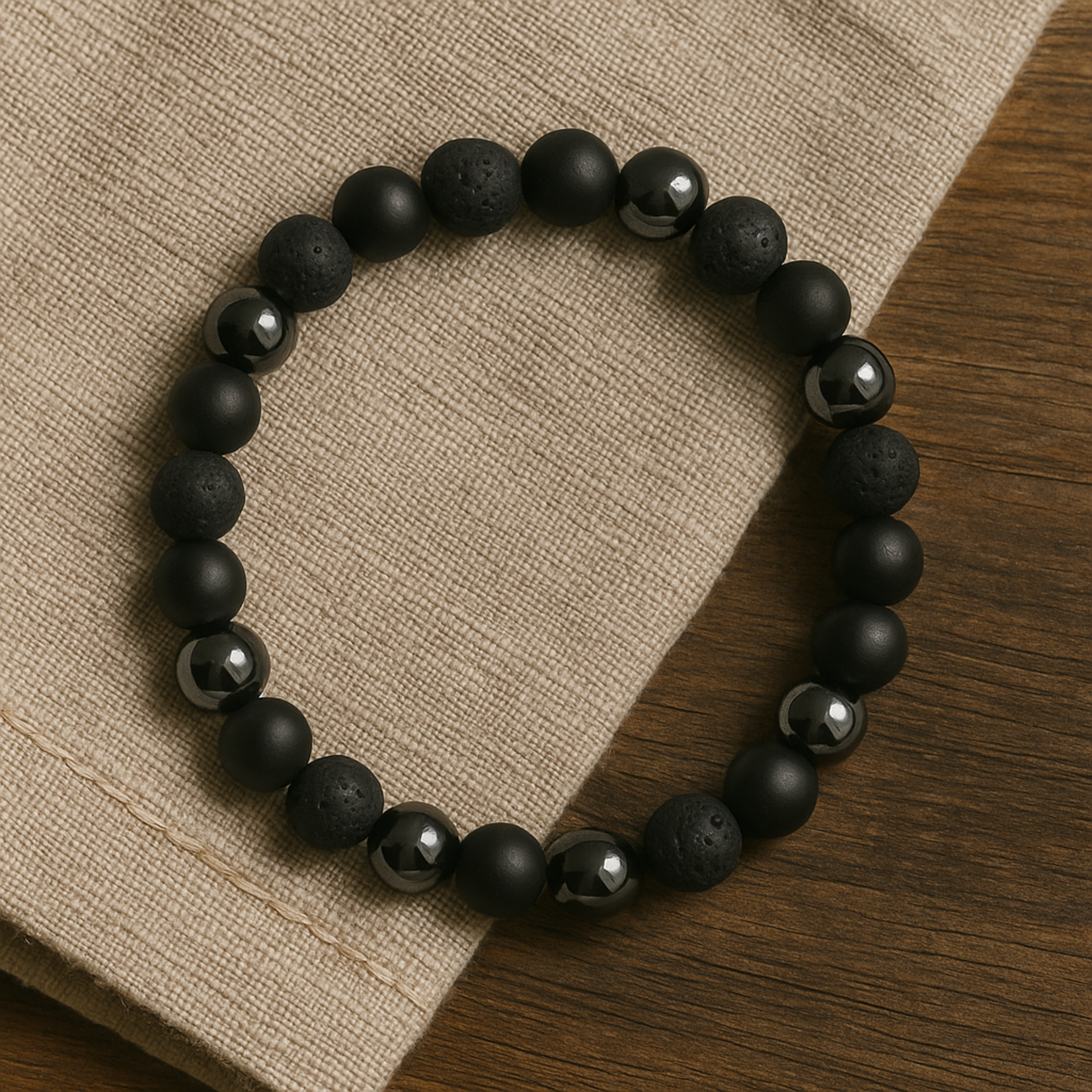 Aura Dorno Aura Dorno Armband Black Lava Ground – handgemaakt van lavasteen, onyx en hematiet