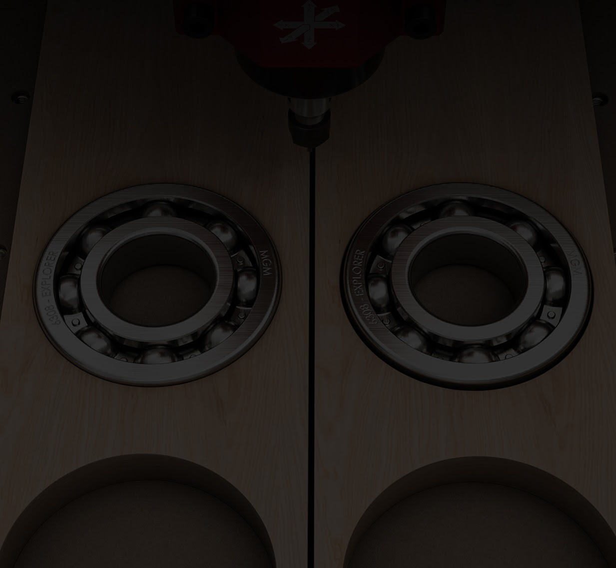 Piece of wood with two milled circles side by side. Each hole fits a ball bearing. Left it fits snugly, right there is some extra room left.