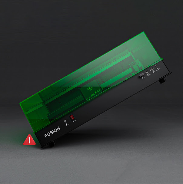 The AtomStack Fusion laser cutter shown tilted at an angle with a red warning exclamation mark icon, demonstrating its automatic tilt detection safety feature.