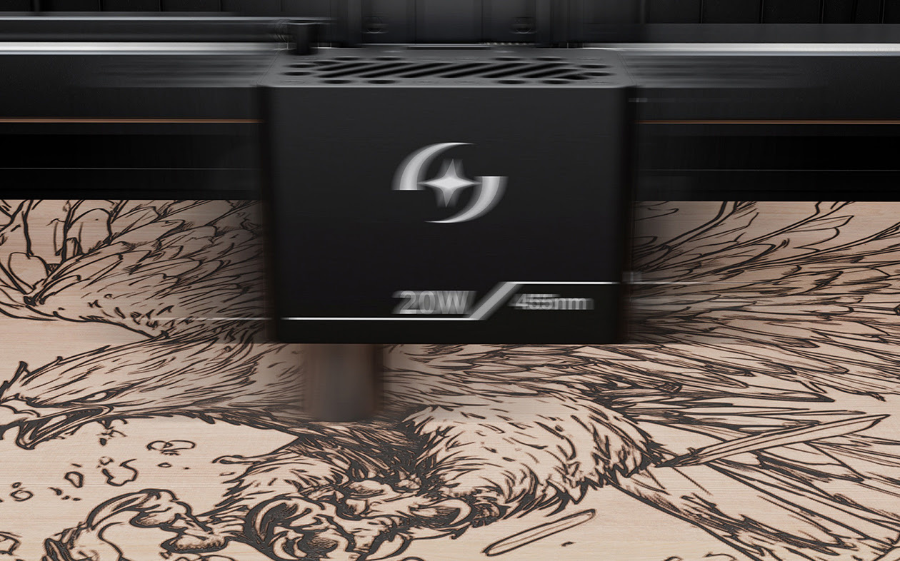 AtomStack Fusion high-speed 20W laser module engraving a detailed eagle design onto a wood panel.