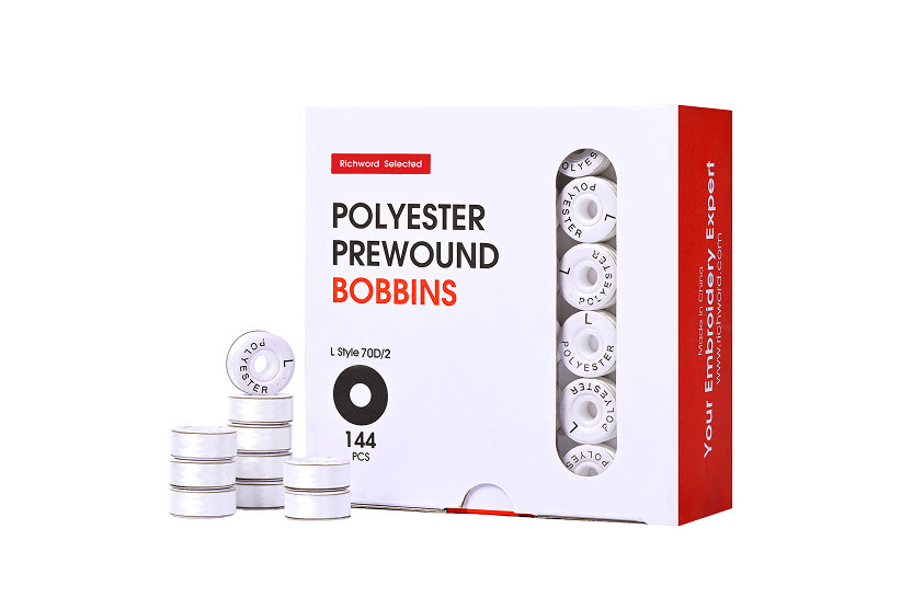 Box of prewound bobbins.