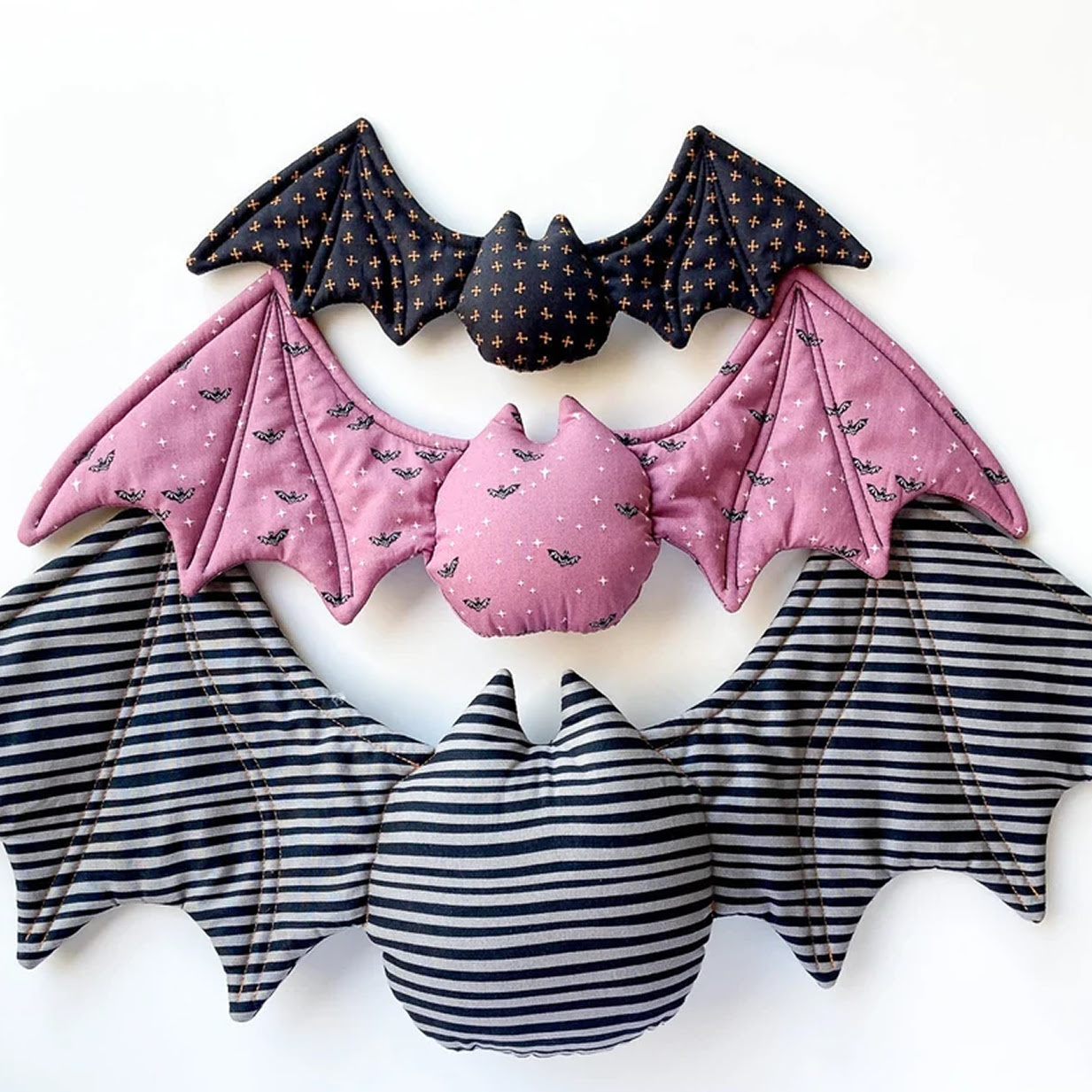 Bat tosy sewn in different types of fabric ranging from small to large.