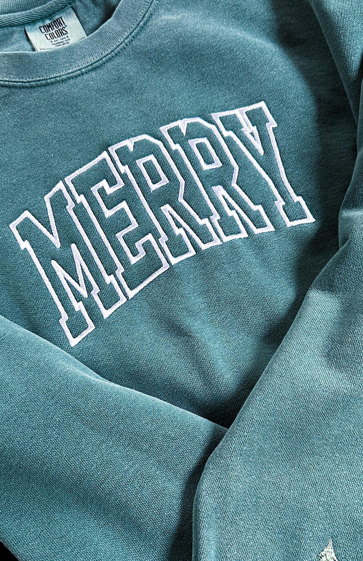 Four towels iwth embroidered names.