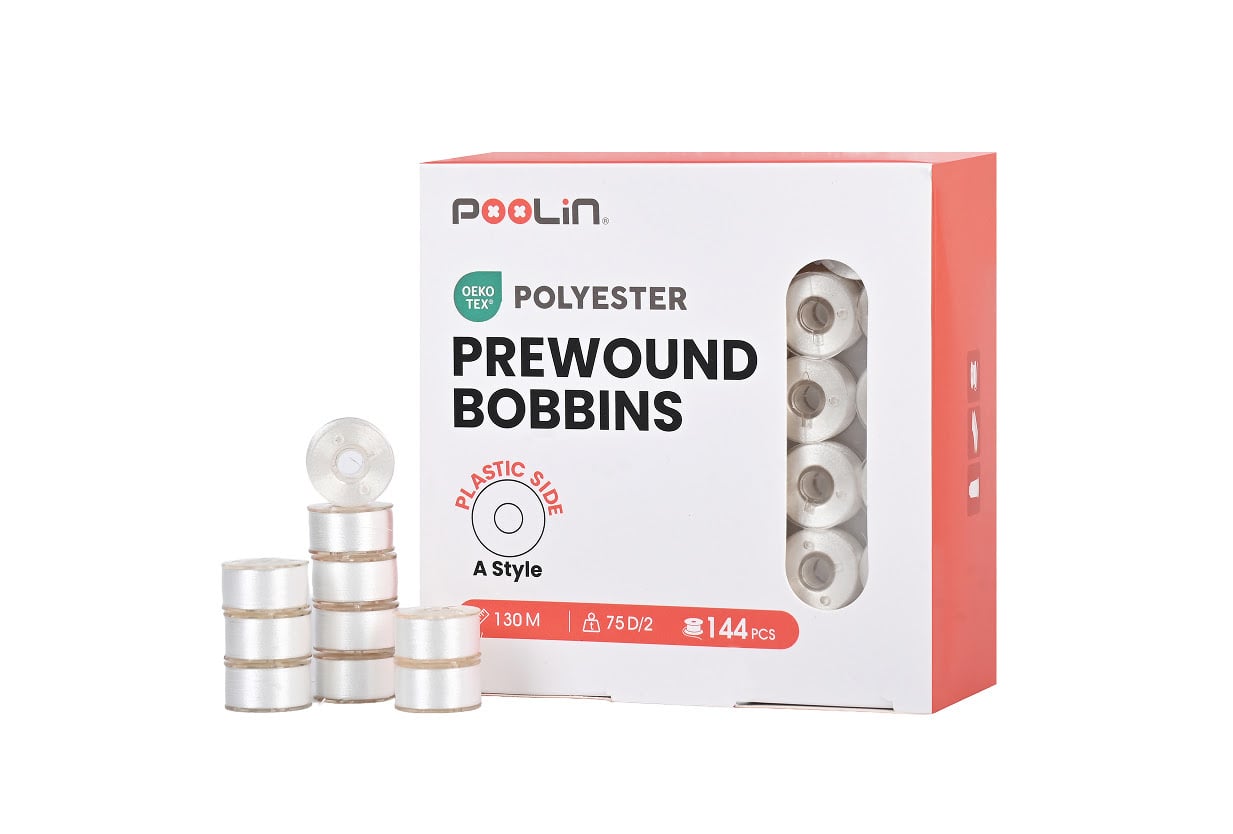 Box of prewound bobbins.