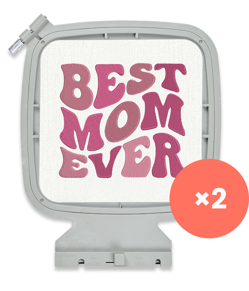 14 x 14 cm embroidery hoop with a design the text Best Mom Ever in pink. A bubble shows x2 indicating two hoops are provided with the machine.