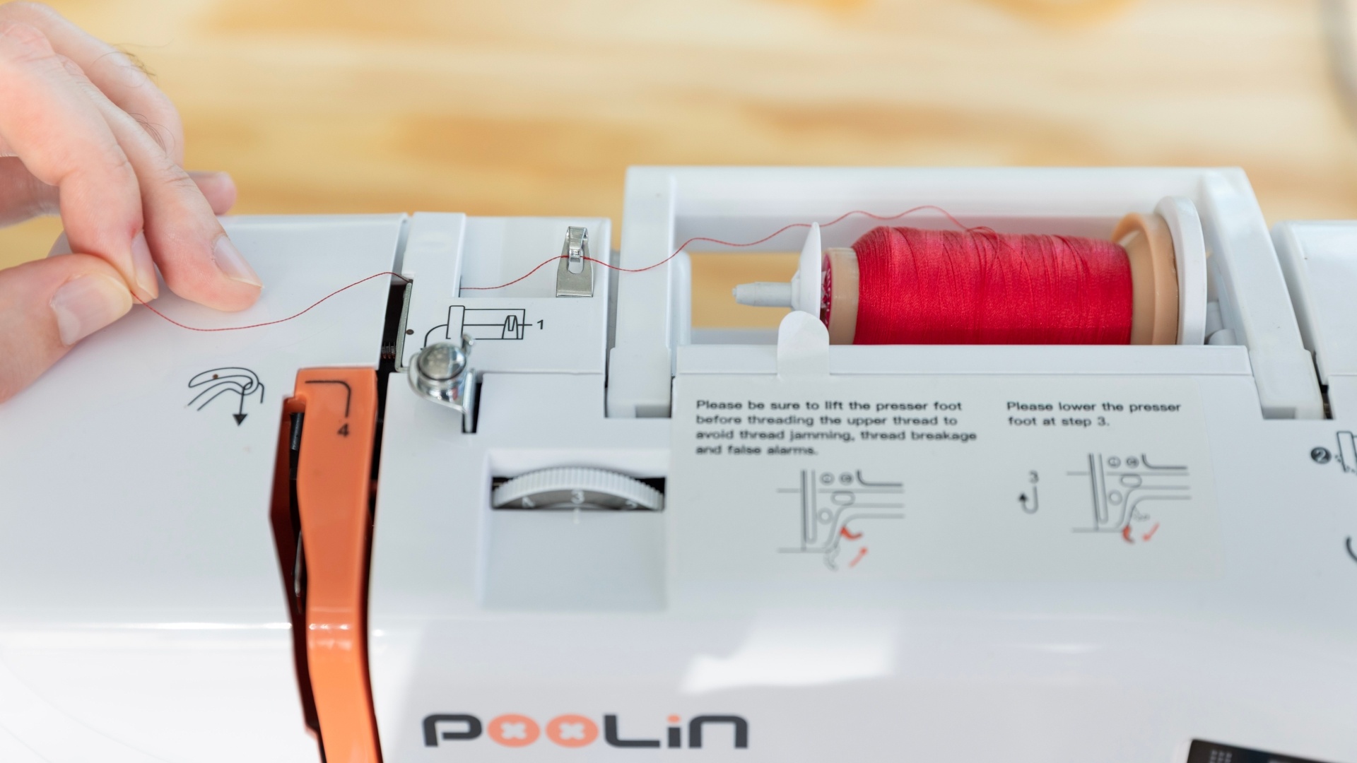 Step 2: pull the thread under the plastic lip