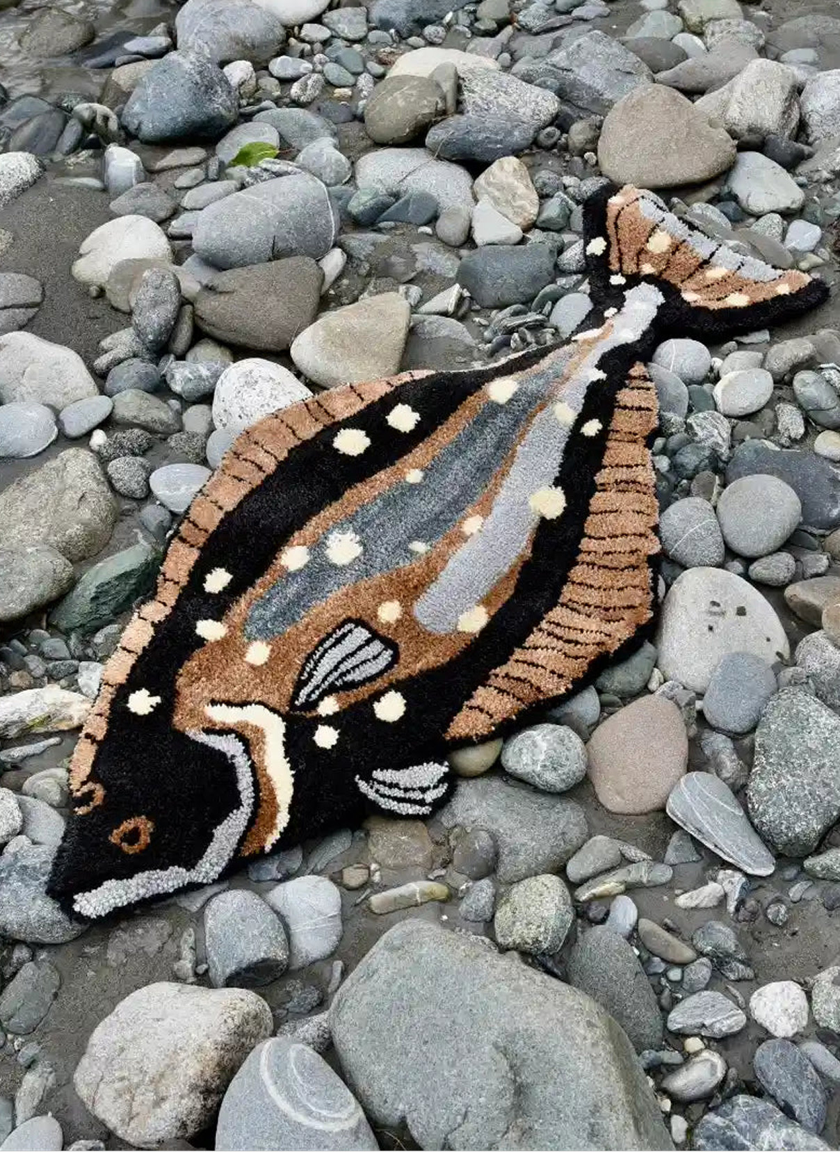 Tufted rug of a fish.