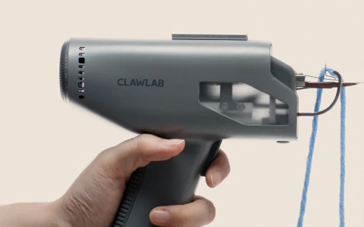 Close-up profile of the lightweight grey Clawlab H1 tufting gun