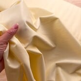 Cupro tricot - botergeel
