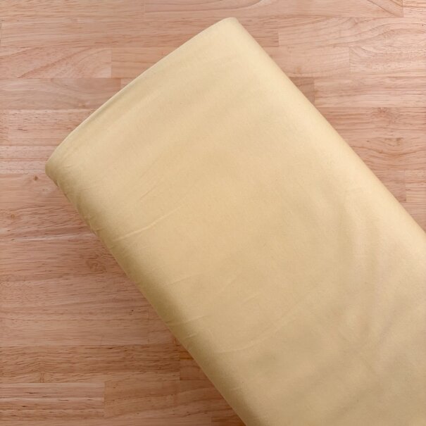 Cupro tricot - botergeel
