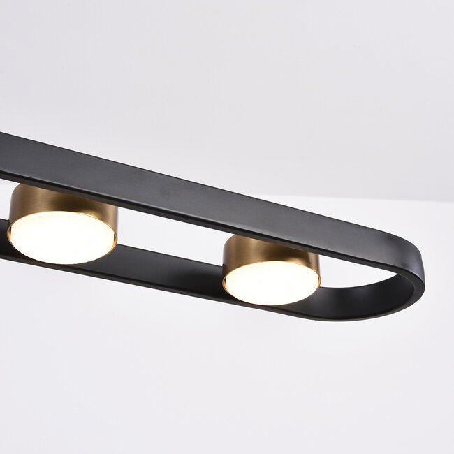 Schwarze Pendelleuchte Sesto mit goldenen Details