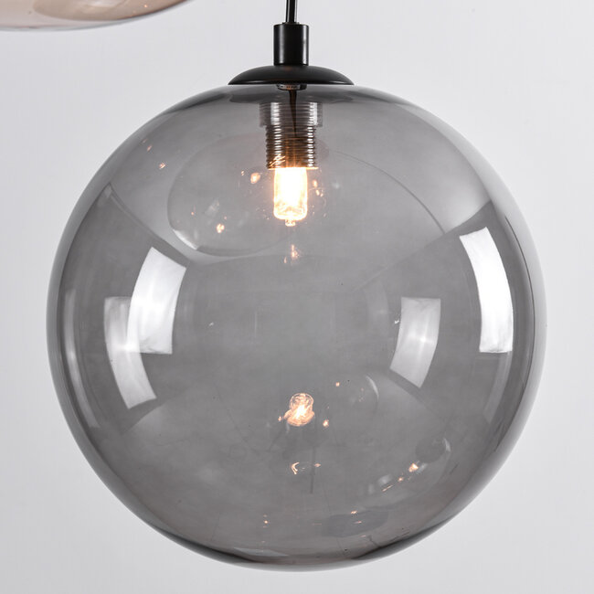 Lampe suspendue Luminor à 4 lumières avec différentes boules de verre