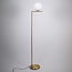 Lampadaire design Connor en doré et verre blanc laiteux