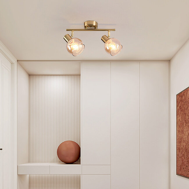 Plafonnier doré Phiene avec 2 spots en verre ambré orientables