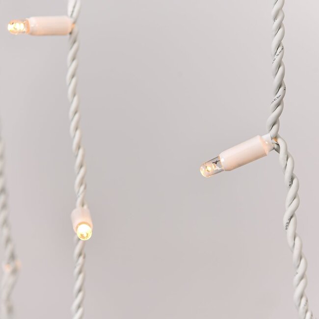 Guirlande stalactite connectable | à partir de 3 mètres | 114 LED | blanc chaud | câble blanc | caoutchouc