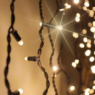 Rideau lumineux noir reliable | à partir de 2 mètres | 300 LEDs | 2200K blanc extra chaud avec scintillement | caoutchouc