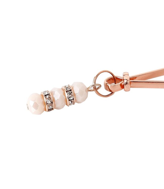 Verführerische Nippelklemmen mit Strasssteinen in Roségold – Luxus für die Sinne