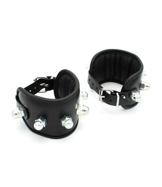 Kiotos Adjustable Leather Padded Handcuffs with Spikes for Edgy Comfort